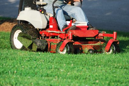 Lawn mowing by Jason's Quality Landscaping.